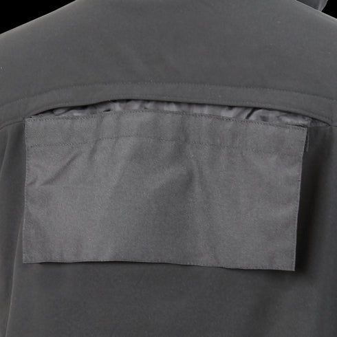 Close-up of the Condor Covert Softshell Jacket in dark gray, featuring a rectangular flap over a vented back section—designed for comfort and functionality, ideal for bushcraft or law enforcement. Now on SALE.