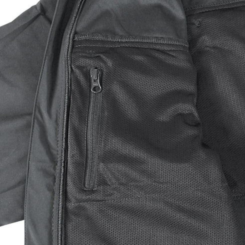 Close-up of the Condor Covert Softshell Jacket | SALE in black, featuring a zippered mesh pocket and detailed stitching—ideal for EDC or law enforcement who value organization and durability.