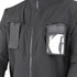 A close-up of the Condor Covert Softshell Jacket | SALE, a black EDC jacket with two chest pockets—one with a flap, the other featuring a transparent window showing a partially visible card.