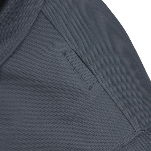 Close-up of the Condor Short Sleeve Performance Tactical Polo in dark gray, featuring a small rectangular welt pocket and visible stitching—designed for durability, ideal for First Responder or Military uniforms.