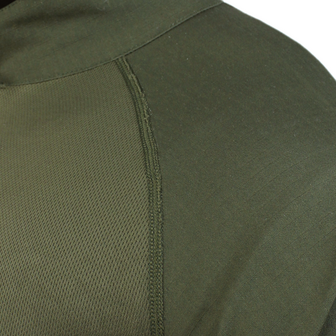Close-up of the Condor Long Sleeve Combat Shirt shows two olive green fabrics—fine mesh and solid—joined by a visible seam.