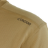 Close-up of a tan textured Maxfort Short Sleeve Training Top by Condor, featuring CONDOR printed in black near the shoulder—ideal for EDC or bushcraft activities.