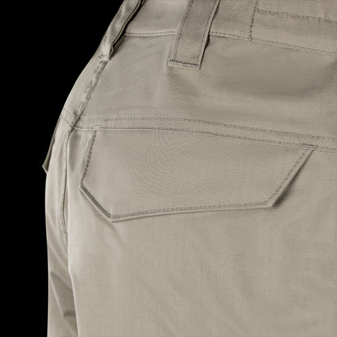 Close-up view of the back pocket area of Condor Scout Shorts in light khaki, featuring visible stitching and belt loops.
