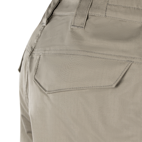Close-up view of the back pocket area of Condor Scout Shorts in light khaki, featuring visible stitching and belt loops.