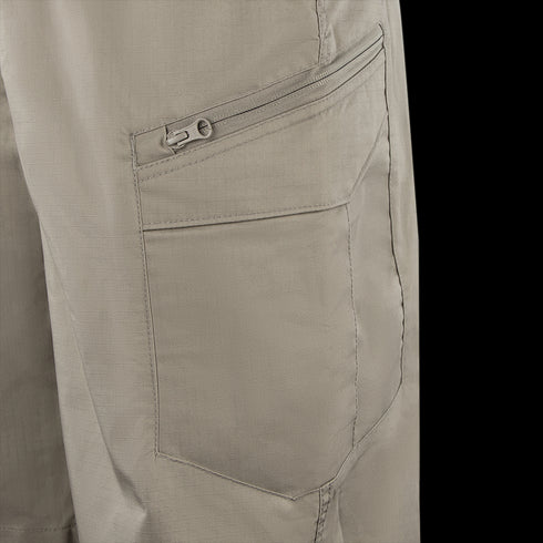 Close-up of Condors Scout Shorts in beige, showing a zippered pocket above a larger open pocket with visible stitching—designed for law enforcement and first responders.
