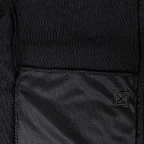 Close-up of the Condor Bravo Fleece Jacket’s black fabric pocket with a small patch featuring two crossed tools stitched on the lower right corner—ideal for EDC or First Responders.