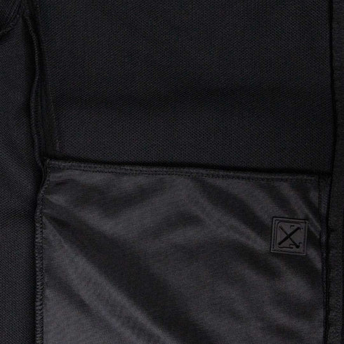 Close-up of the Condor Bravo Fleece Jacket’s black fabric pocket with a small patch featuring two crossed tools stitched on the lower right corner—ideal for EDC or First Responders.
