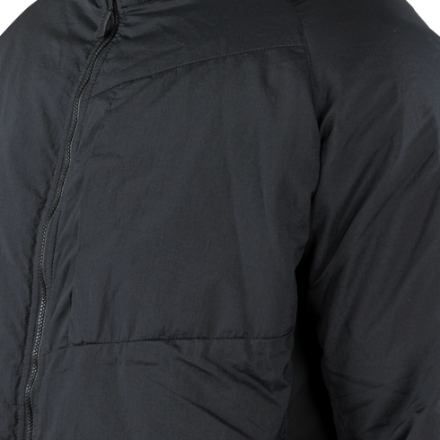 Close-up of the Condor Nimbus Light Loft Jacket (SALE), a black tactical puffer with visible zipper and quilted stitching, shown on an unidentified person.
