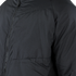 Close-up of the Condor Nimbus Light Loft Jacket (SALE), a black tactical puffer with visible zipper and quilted stitching, shown on an unidentified person.