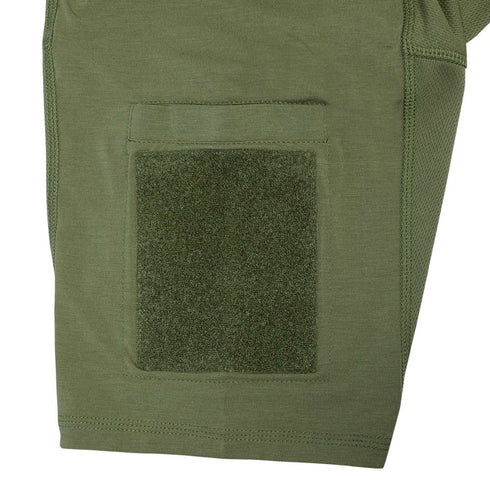Close-up of the Condor Trident Short Sleeve Battle Top’s green sleeve, featuring a rectangular hook-and-loop fastener patch and stitched pocket, commonly used in tactical gear.