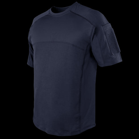 The Condor Trident Short Sleeve Battle Top in navy features visible stitching, a crew neck, and a Velcro patch on the left sleeve—perfect for military or first responder use.