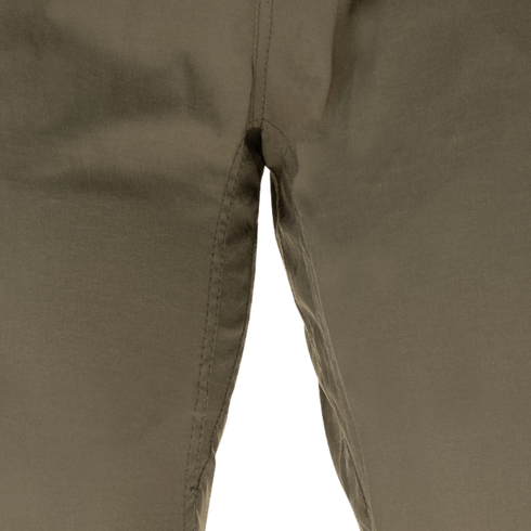 Close-up of the crotch area of Condor Cipher Pants in olive green, highlighting fabric texture and central seam.