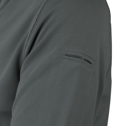 Close-up of the Condor Long Sleeve Performance Tactical Polo in dark gray, highlighting its textured fabric and a small horizontal pocket or pen slot near the shoulder.