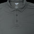 A close-up of a gray Condor Long Sleeve Performance Tactical Polo featuring a collar, three buttons, and visible brand labeling inside the neckline.