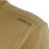 Close-up of a tan mesh Maxfort Long Sleeve Training Top by Condor, featuring CONDOR in black near the shoulder—perfect for law enforcement or EDC use.