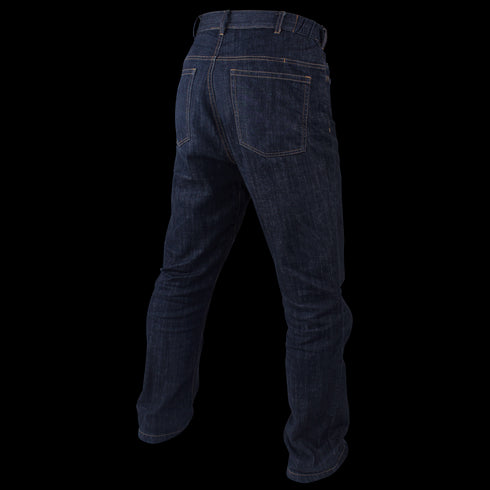 A person wearing Condor Cipher Jeans in dark blue denim, shown from the back with visible back pockets and brown stitching—ideal for off-duty law enforcement or first responders who value comfort and durability.