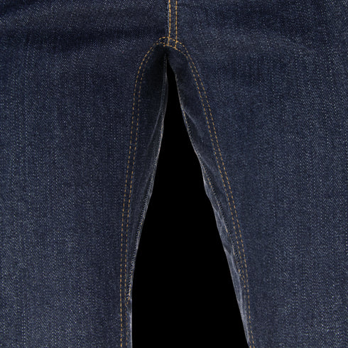 Close-up view of the inner thigh and crotch area of Cipher Jeans by Condor in dark blue denim with yellow stitching, popular among Military and Law Enforcement for their durability.