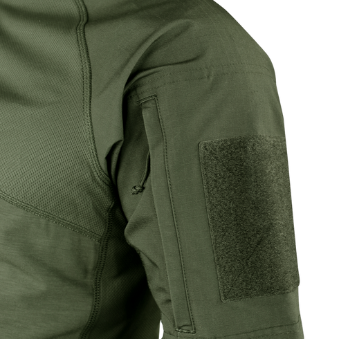 Close-up of Condors Short Sleeve Combat Shirt in green, showing a zippered pocket and large velcro patch panel—perfect for law enforcement or EDC enthusiasts. Now on SALE!.