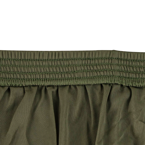 Close-up of olive green Condor Running Shorts fabric with multiple rows of stitching and gathered pleats, featuring a tactical elastic waistband ideal for active use.