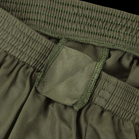 Close-up of the olive green elastic waistband with a fabric belt loop on Condor Running Shorts.