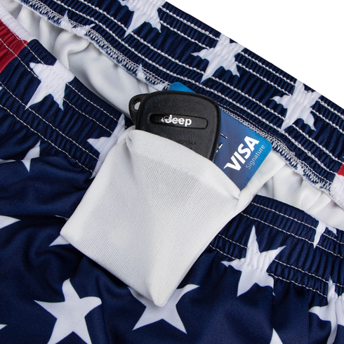 A close-up of a white pocket on Condor Running Shorts, holding a Jeep key fob and a blue Visa Signature credit card—essentials for any tactical or everyday adventure.