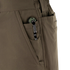 A close-up of a green folding knife, a must-have EDC tool, clipped to the front pocket of Condor Maverick Shorts.