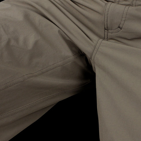 Close-up of Condor Maverick Shorts in brown, highlighting visible seams and stitching on the crotch and upper thigh area.