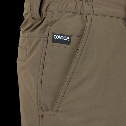 Close-up of Condor Maverick Shorts in brown, featuring a visible side pocket and a branded label above the pocket—ideal for military or law enforcement use.