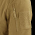 Close-up of the Condor Westpac Softshell Jackets tan sleeve, highlighting a vertical zipper pocket and a large rectangular hook-and-loop patch.