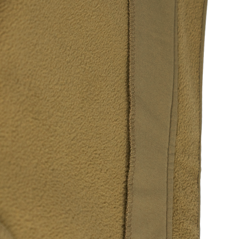 Close-up of the tan fleece fabric and vertical seam on the Condor Westpac Softshell Jacket, commonly used in Military and First Responder apparel.