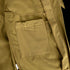 Close-up of the Condor Westpac Softshell Jacket in khaki, showcasing a stitched rectangular pocket and fabric belt loop detail, crafted for Military utility.