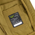 Close-up of a brown Condor Westpac Softshell Jacket, favored in military and tactical circles, featuring an interior label with care instructions and the Condor brand.