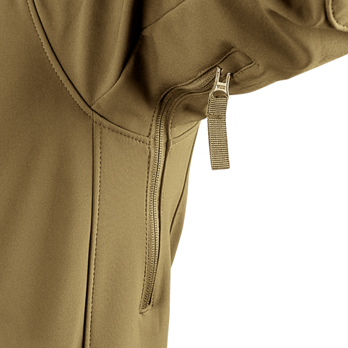 Close-up of the Condor Westpac Softshell Jackets tan sleeve, highlighting a vertical zipper pocket and detailed seam stitching.