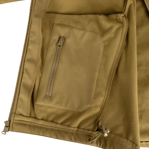 Close-up of the Condor Westpac Softshell Jacket in tan, featuring a zippered interior pocket and adjustable drawstring hem, designed for first responders.