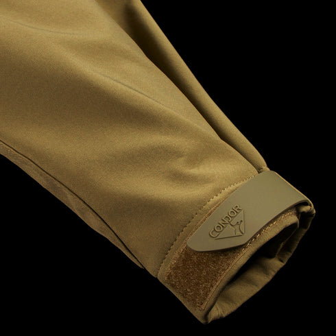 A close-up of the sleeve cuff of the Condor Westpac Softshell Jacket, featuring an adjustable Velcro strap.