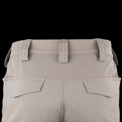 Close-up view of the back of Condor Patrol ADF Pants in light beige, featuring belt loops, a waistband, and two angled flap back pockets.