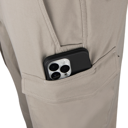 A smartphone with three rear cameras is partially visible in the side pocket of Condor Patrol ADF Pants.