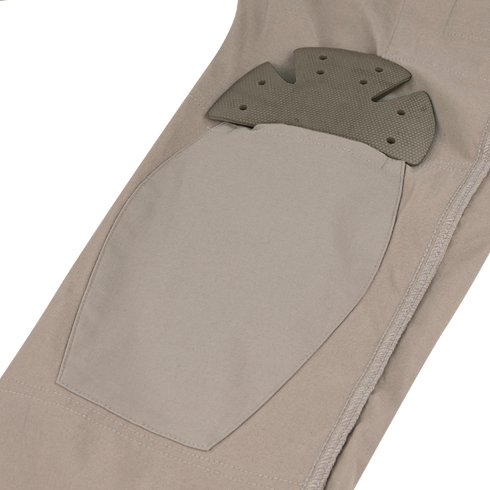 A close-up of Condors Patrol ADF Pants in tan shows an external pocket with a removable, textured knee pad insert—perfect for military or law enforcement professionals needing comfort and protection.