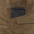 A black magazine is partially visible in the side pocket of tan Condor Paladin Tactical Pants.