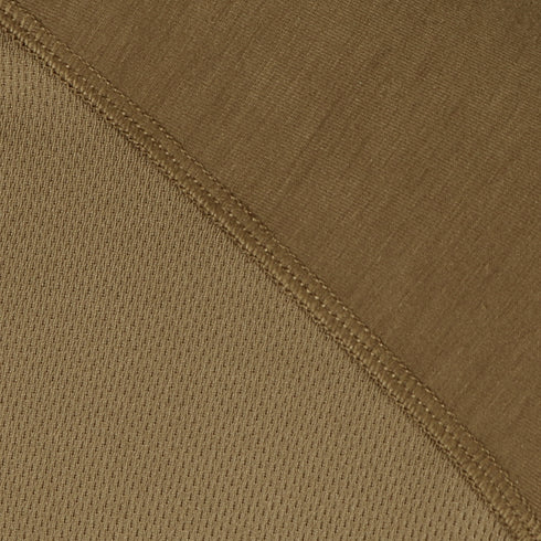 Close-up of two brown fabric panels with contrasting textures and a visible stitched seam running diagonally, featured on the Condor Trident Long Sleeve Battle Top.