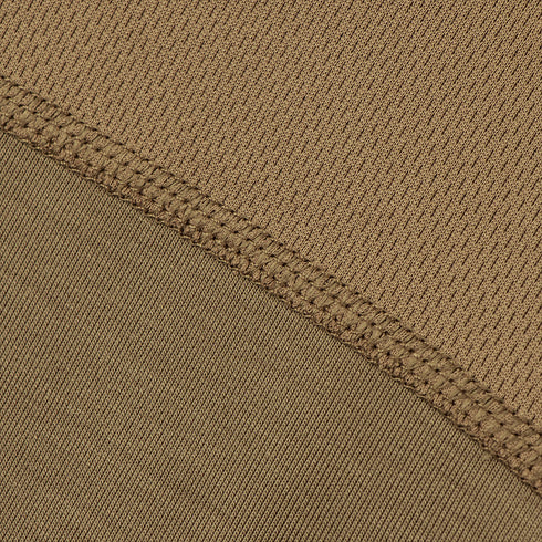 Close-up of two overlapping sections of the Condor Trident Long Sleeve Battle Top in brown, showing visible stitching and contrasting textures—one ribbed, one smooth.