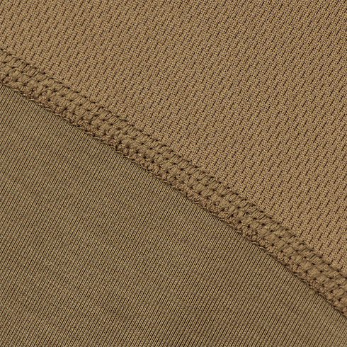 Close-up of two overlapping sections of the Condor Trident Long Sleeve Battle Top in brown, showing visible stitching and contrasting textures—one ribbed, one smooth.