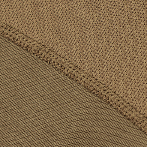 Close-up of two overlapping sections of the Condor Trident Long Sleeve Battle Top in brown, showing visible stitching and contrasting textures—one ribbed, one smooth.