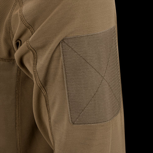 Close-up of the Condor Trident Long Sleeve Battle Top in brown, featuring a reinforced fabric patch on the elbow and detailed stitching that highlights its durable texture.