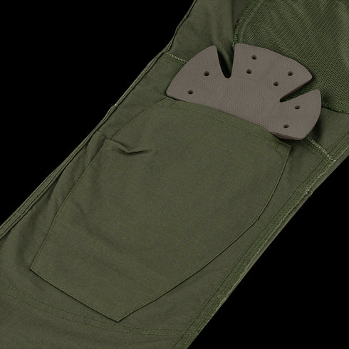 Close-up of a green fabric pocket on Condor Odyssey Pants Gen III with a partially inserted removable black foam knee pad, designed for Military and First Responder use.