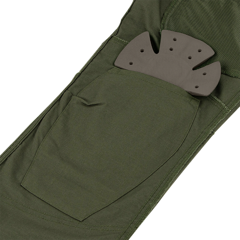 Close-up of a green fabric pocket on Condor Odyssey Pants Gen III with a partially inserted removable black foam knee pad, designed for Military and First Responder use.
