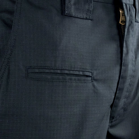 Close-up of Condor Womens Protector EMS Pants in dark color, featuring a zippered fly, waistband, and horizontal slit pocket—perfect for first responders or military use.