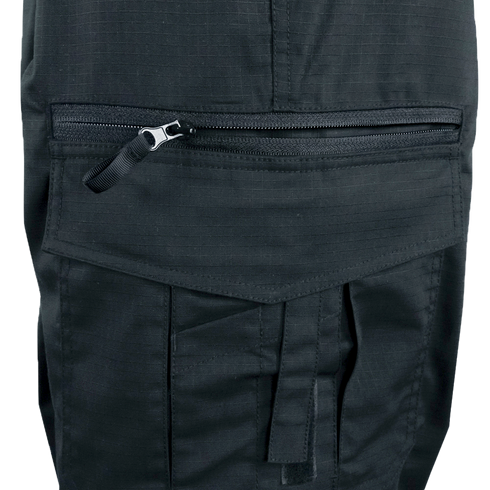 Close-up of Condor Womens Protector EMS Pants in black, highlighting a horizontal zippered pocket above a flap pocket with tab and stitching, designed for first responders.