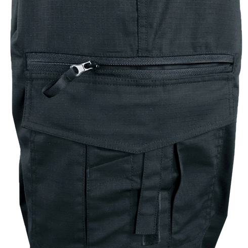 Close-up of Condor Womens Protector EMS Pants in black, highlighting a horizontal zippered pocket above a flap pocket with tab and stitching, designed for first responders.