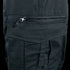Close-up of Condor Womens Protector EMS Pants in black, highlighting a horizontal zippered pocket above a flap pocket with tab and stitching, designed for first responders.